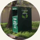 A green Recycle for Change clothes and shoes collection box